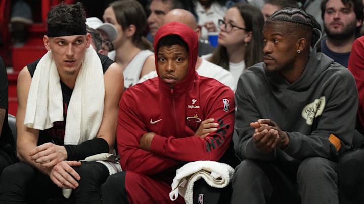 Jan 8, 2024; Miami, Florida, USA;  Miami Heat guard Tyler Herro, left, guard Kyle Lowry, center, and