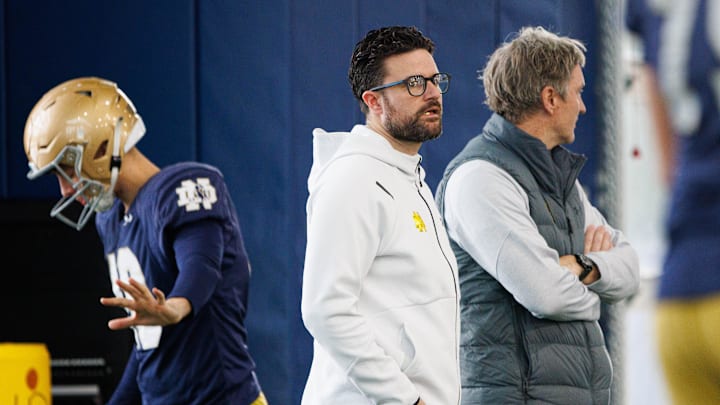 Notre Dame assistant athletics director Chad Bowen, center, watches a Notre Dame football practice at Irish Athletic Center on Sunday, Jan. 5, 2025, in South Bend.