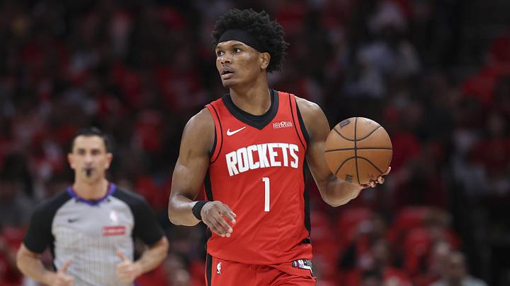 Apr 24, 2026; Houston, Texas, USA; Houston Rockets guard/forward Amen Thompson (1) controls the ball during the first quarter against the Los Angeles Lakers during game three of the first round of the 2026 NBA Playoffs at Toyota Center. Mandatory Credit: Troy Taormina-Imagn Images