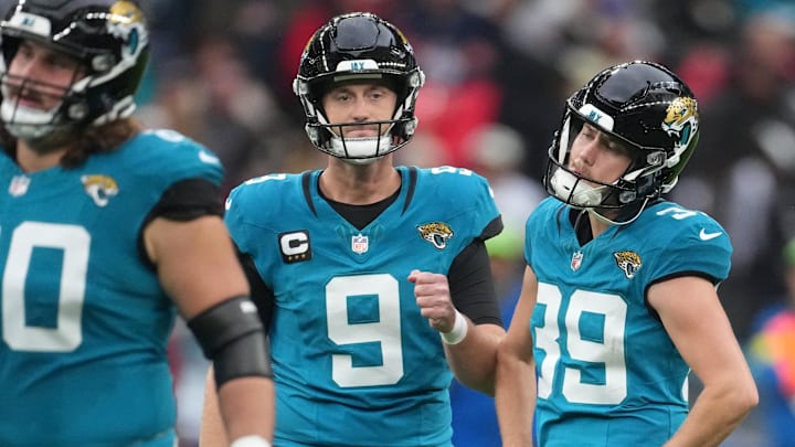 Oct 19, 2025; London, United Kingdom; Jacksonville Jaguars punter Logan Cooke (9) reacts after kicker Cam Little (39) missed a field goal against the Los Angeles Rams during the first half of an NFL International Series game at Wembley Stadium. Mandatory Credit: Kirby Lee-Imagn Images