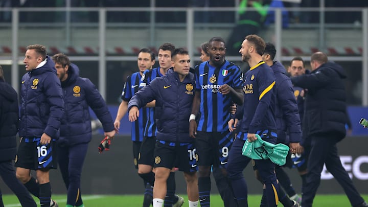 Milan, Italy, 6th November 2024. Lautaro Martinez of FC Internazionale looks on as team mates Marcus Thuram and Marko Arnautovic react following the final whistle of the UEFA Champions League match at Giuseppe Meazza, Milan