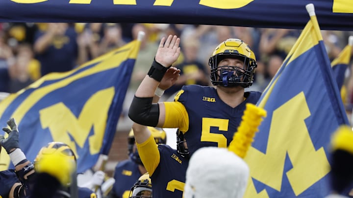 Sep 13, 2025; Ann Arbor, Michigan, USA;  Michigan Wolverines offensive lineman Andrew Sprague (54) enters the field before the game against the Central Michigan Chippewas at Michigan Stadium. Mandatory Credit: Rick Osentoski-Imagn Images