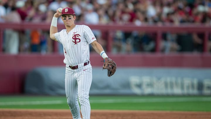 Florida State Seminoles infielder Cal Fisher (4) throws to first. The Florida State Seminoles hosted the Florida Gators at Dick Howser Stadium on Tuesday, April 7, 2026.