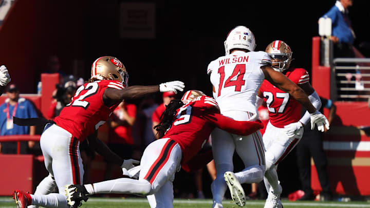 Oct 6, 2024; Santa Clara, California, USA; Arizona Cardinals wide receiver Michael Wilson (14) carries the ball against the San Francisco 49ers during the fourth quarter at Levi's Stadium. Mandatory Credit: Kelley L Cox-Imagn Images Oct 6, 2024; Santa Clara, California, USA; Arizona Cardinals wide receiver Michael Wilson (14) carries the ball against the San Francisco 49ers during the fourth quarter at Levi's Stadium. Mandatory Credit: Kelley L Cox-Imagn Images