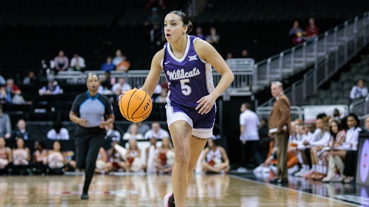 Mar 11, 2024; Kansas City, MO, USA; Kansas State Wildcats guard Brylee Glenn (5) brings the ball up court during the second half against the Texas Longhorns at T-Mobile Center. Mandatory Credit: William Purnell-Imagn Images