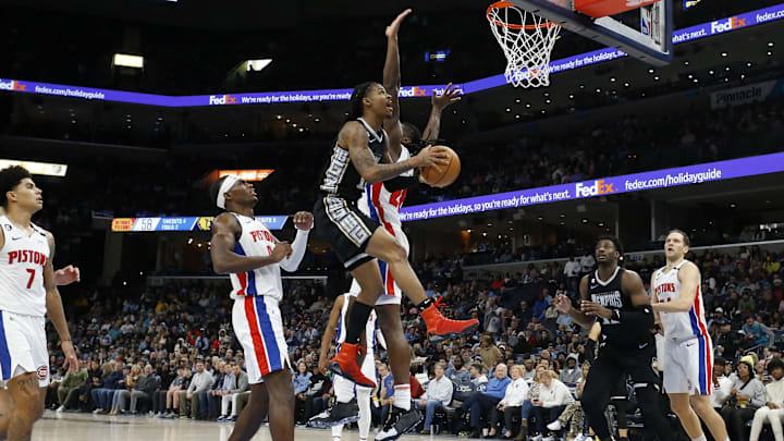Memphis Grizzlies guard Ja Morant (12) drives to the basket against the Detroit Pistons during the second half at FedExForum. Mandatory Credit: Petre Thomas-Imagn Images