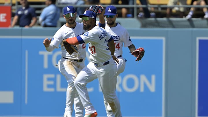 Apr 30, 2025; Los Angeles, California, USA; Los Angeles Dodgers left fielder Michael Conforto (23), right fielder Teoscar Hernandez (37) and center fielder Andy Pages (44) head off the field following the final out of the ninth inning defeating the Miami Marlins at Dodger Stadium. Mandatory Credit: Jayne Kamin-Oncea-Imagn Images Apr 30, 2025; Los Angeles, California, USA; Los Angeles Dodgers left fielder Michael Conforto (23), right fielder Teoscar Hernandez (37) and center fielder Andy Pages (44) head off the field following the final out of the ninth inning defeating the Miami Marlins at Dodger Stadium. Mandatory Credit: Jayne Kamin-Oncea-Imagn Images