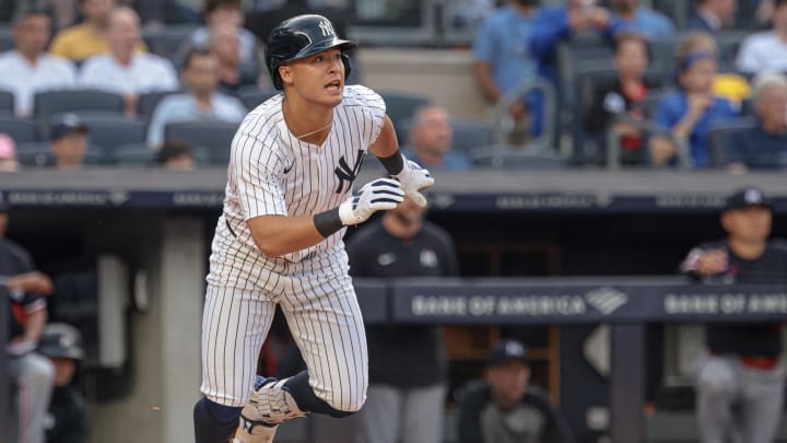 Jun 5, 2024; Bronx, New York, USA; New York Yankees shortstop Anthony Volpe (11) singles during the first inning against the Minnesota Twins at Yankee Stadium. Mandatory Credit: Vincent Carchietta-USA TODAY Sports