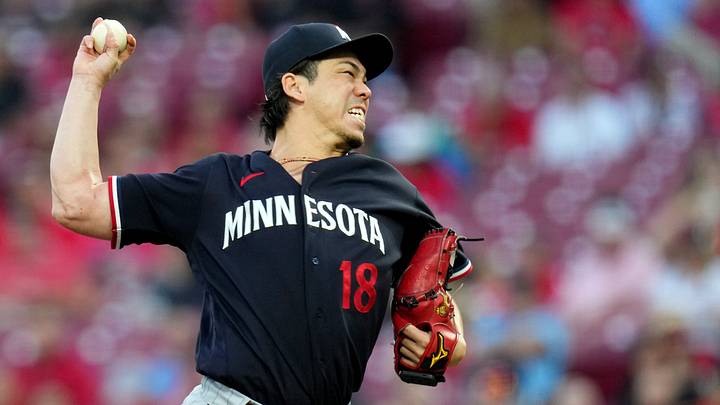 Kenta Maeda delivers a pitch in the second inning of a baseball game against the Cincinnati Reds