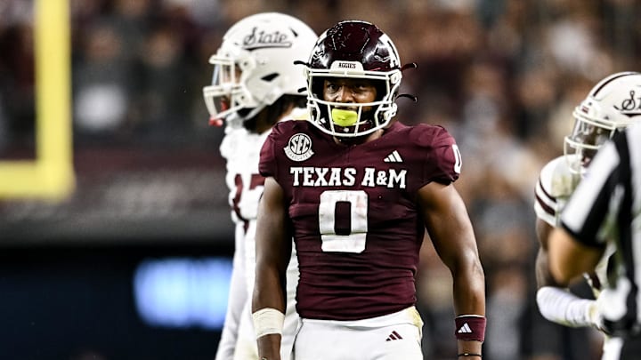 Nov 11, 2023; College Station, Texas, USA; Texas A&M Aggies wide receiver Ainias Smith (0) stands on the field during the second half against the Mississippi State Bulldogs at Kyle Field. Mandatory Credit: Maria Lysaker-Imagn Images