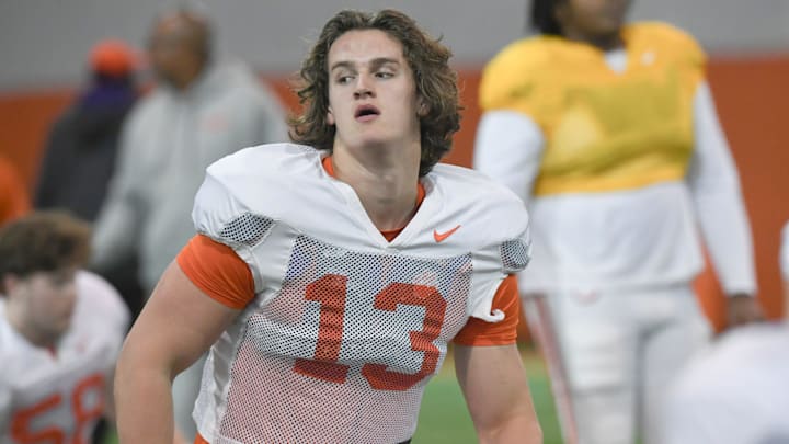Clemson defensive end Will Heldt (13) stretches during the football practice at the Allen N. Reeves Football Complex at Clemson University in Clemson, S.C. Wednesday, March 5, 2025.