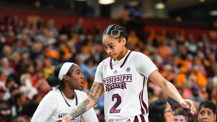 Mississippi State guard Jerkaila Jordan (2) high-fives teammates as she comes off the court during the third quarter of the SEC Women's Basketball Tournament game three at the Bon Secours Wellness Arena in Greenville, S.C. Thursday, March 7, 2024.