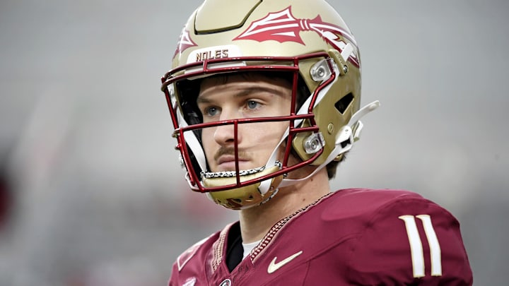 Oct 5, 2024; Tallahassee, Florida, USA; Florida State Seminoles quarterback Brock Glenn (11) looks on before the game against the Clemson Tigers at Doak S. Campbell Stadium. Mandatory Credit: Melina Myers-Imagn Images
