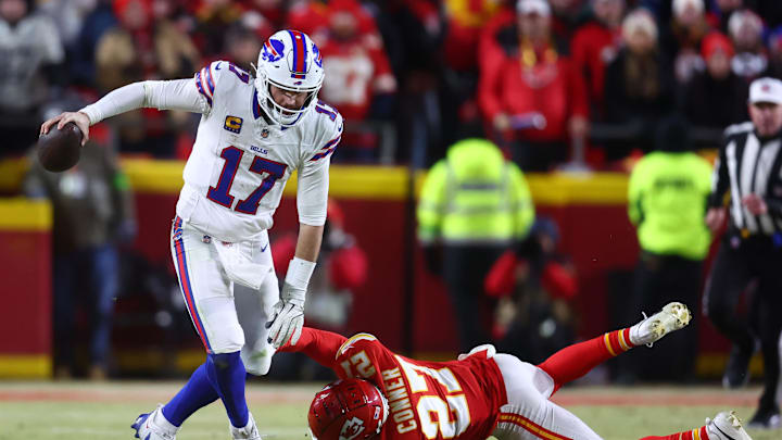 Jan 26, 2025; Kansas City, MO, USA; Buffalo Bills quarterback Josh Allen (17) rushes the ball past Kansas City Chiefs safety Chamarri Conner (27) during the second half in the AFC Championship game at GEHA Field at Arrowhead Stadium. Mandatory Credit: Mark J. Rebilas-Imagn Images Jan 26, 2025; Kansas City, MO, USA; Buffalo Bills quarterback Josh Allen (17) rushes the ball past Kansas City Chiefs safety Chamarri Conner (27) during the second half in the AFC Championship game at GEHA Field at Arrowhead Stadium. Mandatory Credit: Mark J. Rebilas-Imagn Images