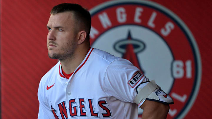 Jul 28, 2025; Anaheim, California, USA; Los Angeles Angels designated hitter Mike Trout (27) looks on from the dugout during the game against the Texas Rangers at Angel Stadium. Mandatory Credit: Jayne Kamin-Oncea-Imagn Images Jul 28, 2025; Anaheim, California, USA; Los Angeles Angels designated hitter Mike Trout (27) looks on from the dugout during the game against the Texas Rangers at Angel Stadium. Mandatory Credit: Jayne Kamin-Oncea-Imagn Images