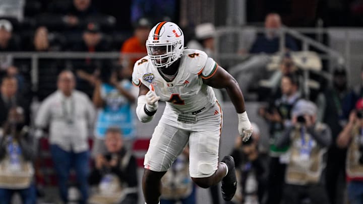 Dec 31, 2025; Arlington, TX, USA; Miami Hurricanes defensive lineman Rueben Bain Jr. (4) rushes the line during the 2025 Cotton Bowl and quarterfinal game of the College Football Playoff at AT&T Stadium. Mandatory Credit: Jerome Miron-Imagn Images