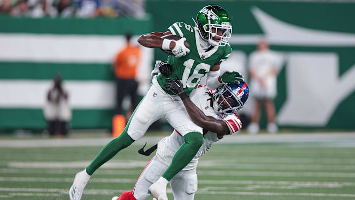 Aug 24, 2024; East Rutherford, New Jersey, USA; New York Jets wide receiver Jason Brownlee (16) is tackled by New York Giants cornerback David Long Jr. (20) during the first half at MetLife Stadium. Mandatory Credit: Vincent Carchietta-Imagn Images Aug 24, 2024; East Rutherford, New Jersey, USA; New York Jets wide receiver Jason Brownlee (16) is tackled by New York Giants cornerback David Long Jr. (20) during the first half at MetLife Stadium. Mandatory Credit: Vincent Carchietta-Imagn Images