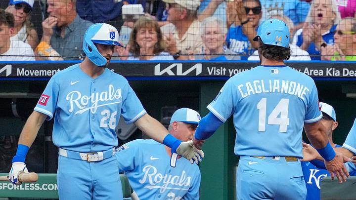 Jun 13, 2026; Kansas City, Missouri, USA; Kansas City Royals right fielder Jac Caglianone (14) celebrates with center fielder Kameron Misner (26) after scoring against the Houston Astros during the second inning at Kauffman Stadium. Mandatory Credit: Denny Medley-Imagn Images