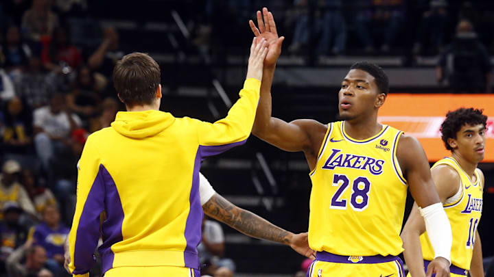 Mar 27, 2024; Memphis, Tennessee, USA; Los Angeles Lakers forward Rui Hachimura (28) reacts with shooting guard Austin Reaves.