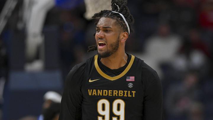 Mar 14, 2026; Nashville, TN, USA;  Vanderbilt Commodores forward Devin McGlockton (99) reacts after a made three point basket against the Florida Gators during the first half at Bridgestone Arena. Mandatory Credit: Steve Roberts-Imagn Images