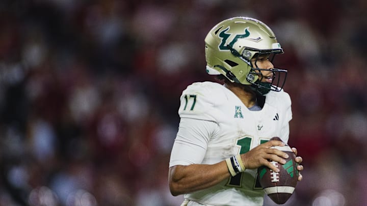 Sep 7, 2024; Tuscaloosa, Alabama, USA; South Florida Bulls quarterback Byrum Brown (17) looks for a pass against the Alabama Crimson Tide during the fourth quarter at Bryant-Denny Stadium. Mandatory Credit: William McLelland-Imagn Images