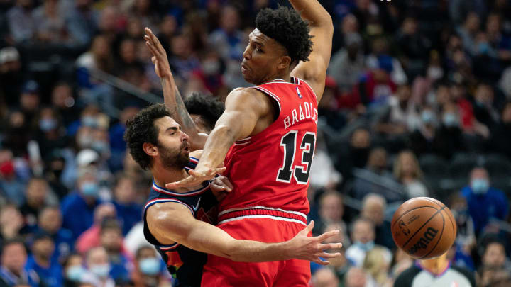 Nov 3, 2021; Philadelphia, Pennsylvania, USA; Philadelphia 76ers guard Furkan Korkmaz (30) passes the ball past Chicago Bulls center Tony Bradley (13) during the second quarter at Wells Fargo Center. Mandatory Credit: Bill Streicher-USA TODAY Sports