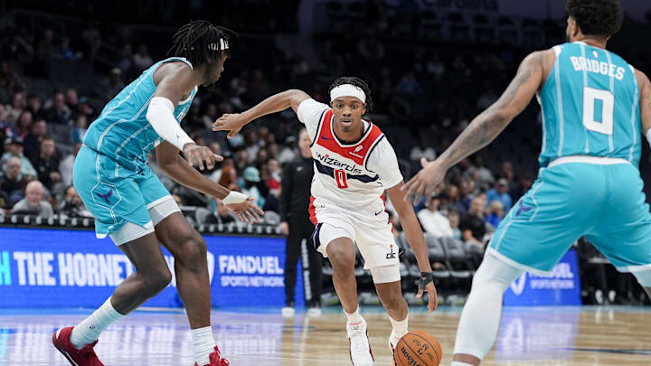Feb 3, 2025; Charlotte, North Carolina, USA; Washington Wizards guard Bilal Coulibaly (0) drives to the basket against Charlotte Hornets center Mark Williams (5) during the second half at Spectrum Center. Mandatory Credit: Jim Dedmon-Imagn Images Feb 3, 2025; Charlotte, North Carolina, USA; Washington Wizards guard Bilal Coulibaly (0) drives to the basket against Charlotte Hornets center Mark Williams (5) during the second half at Spectrum Center. Mandatory Credit: Jim Dedmon-Imagn Images