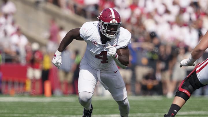 Sep 14, 2024; Madison, Wisconsin, USA; Alabama Crimson Tide linebacker Qua Russaw (4) during the game against the Wisconsin Badgers at Camp Randall Stadium. Mandatory Credit: Jeff Hanisch-Imagn Images Sep 14, 2024; Madison, Wisconsin, USA; Alabama Crimson Tide linebacker Qua Russaw (4) during the game against the Wisconsin Badgers at Camp Randall Stadium. Mandatory Credit: Jeff Hanisch-Imagn Images