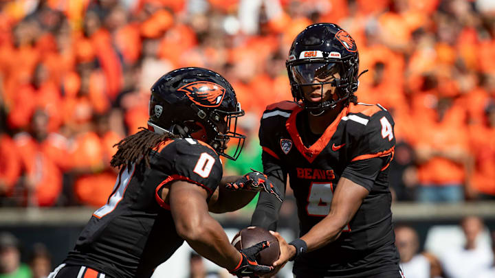 Oregon State quarterback Gevani McCoy hands the ball off to Oregon State running back Anthony Hankerson as the Oregon State Beavers host the Oregon Ducks Saturday, Sept. 14, 2024 at Reser Stadium in Corvallis, Ore.