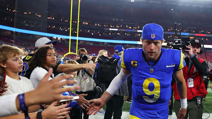 Jan 13, 2025; Glendale, AZ, USA; Los Angeles Rams quarterback Matthew Stafford (9) reacts after the NFC wild card game against the Minnesota Vikings at State Farm Stadium. Mandatory Credit: Mark J. Rebilas-Imagn Images