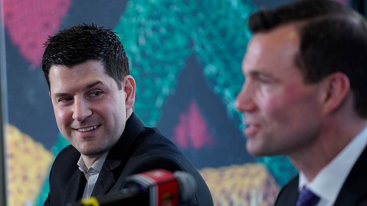 Jun 29, 2022; Chicago, IL, USA; Chicago Blackhawks new head coach Luke Richardson (right) is introduced by Hawks general manager Kyle Davidson, (left) at a press conference at the Chicago Blackhawks Store. Mandatory Credit: David Banks-USA TODAY Sports