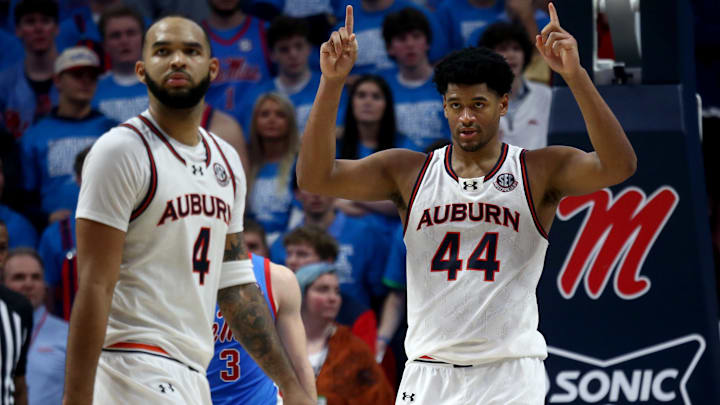 Feb 1, 2025; Oxford, Mississippi, USA; Auburn Tigers center Dylan Cardwell (44) reacts after a dunk during the second half against the Mississippi Rebels at The Sandy and John Black Pavilion at Ole Miss. Mandatory Credit: Petre Thomas-Imagn Images