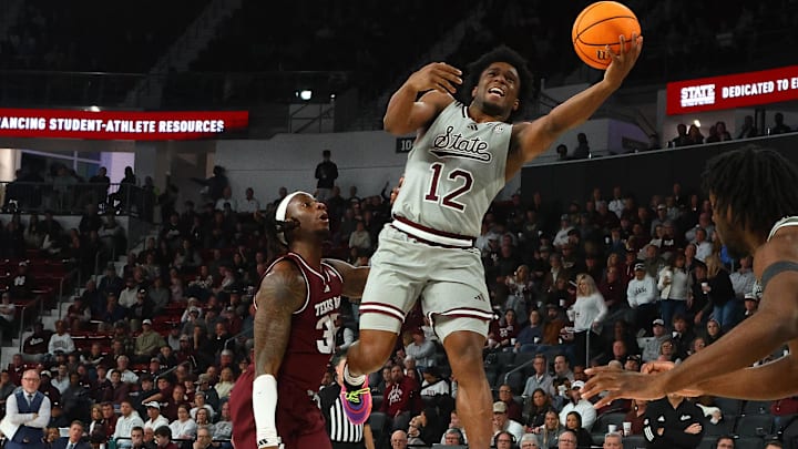 Feb 18, 2025; Starkville, Mississippi, USA; Mississippi State Bulldogs guard Josh Hubbard (12) shoots against Texas A&M Aggies guard Manny Obaseki (35) during the second half at Humphrey Coliseum. Mandatory Credit: Petre Thomas-Imagn Images Feb 18, 2025; Starkville, Mississippi, USA; Mississippi State Bulldogs guard Josh Hubbard (12) shoots against Texas A&M Aggies guard Manny Obaseki (35) during the second half at Humphrey Coliseum. Mandatory Credit: Petre Thomas-Imagn Images