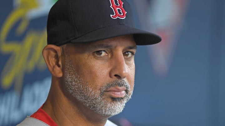 Boston Red Sox manager Alex Cora (13) in the dugout.