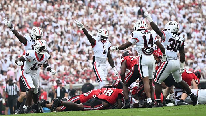 Georgia Football players react to recovering a fumble during UGA Football's Whiteout game against Western Kentucky. Georgia Football players react to recovering a fumble during UGA Football's Whiteout game against Western Kentucky.