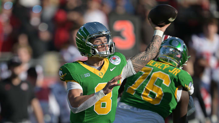 Jan 1, 2025; Pasadena, CA, USA; Oregon Ducks quarterback Dillon Gabriel (8) throws a pass in the first quarter against the Ohio State Buckeyes in the 2025 Rose Bowl college football quarterfinal game at Rose Bowl Stadium.