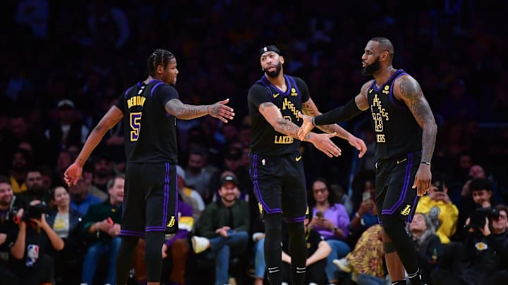 Dec 5, 2023; Los Angeles, California, USA; Los Angeles Lakers forward Cam Reddish (5) forward Anthony Davis (3) and forward LeBron James (23) celebrate a basket scored against the Phoenix Suns during the second half of the In Season Tournament quarterfinal at Crypto.com Arena. Mandatory Credit: Gary A. Vasquez-Imagn Images