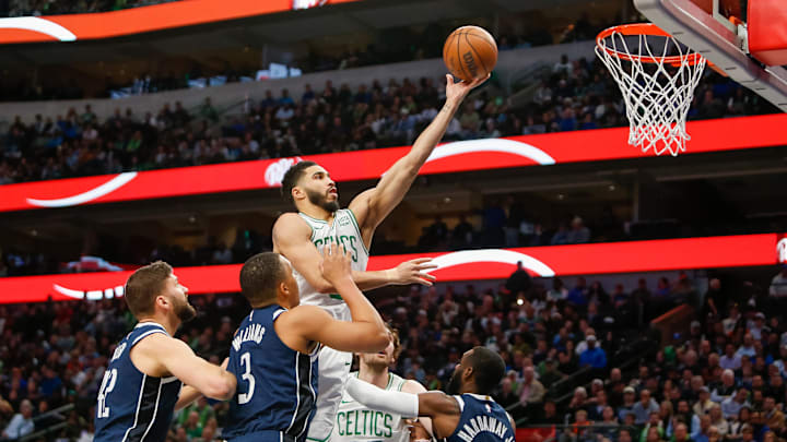 Jan 22, 2024; Dallas, Texas, USA; Boston Celtics forward Jayson Tatum (0) shoots during the first quarter against the Dallas Mavericks at American Airlines Center. Mandatory Credit: Andrew Dieb-USA TODAY Sports