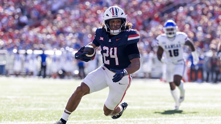 Nov 8, 2025; Tucson, Arizona, USA; Arizona Wildcats running back Quincy Craig (24) runs for a touchdown against the Kansas Jayhawks in the first half at Arizona Stadium. Mandatory Credit: Mark J. Rebilas-Imagn Images