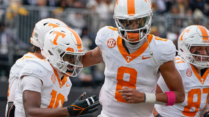 Tennessee wide receiver Mike Matthews (10) celebrates his touchdown with quarterback Nico Iamaleava (8) during the third quarter at FirstBank Stadium in Nashville, Tenn., Saturday, Nov. 30, 2024.