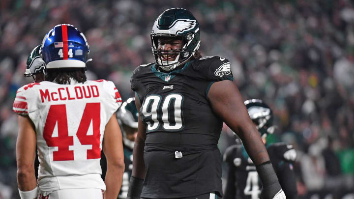 Dec 25, 2023; Philadelphia, Pennsylvania, USA; Philadelphia Eagles defensive tackle Jordan Davis (90) against New York Giants cornerback Nick McCloud (44) at Lincoln Financial Field. 