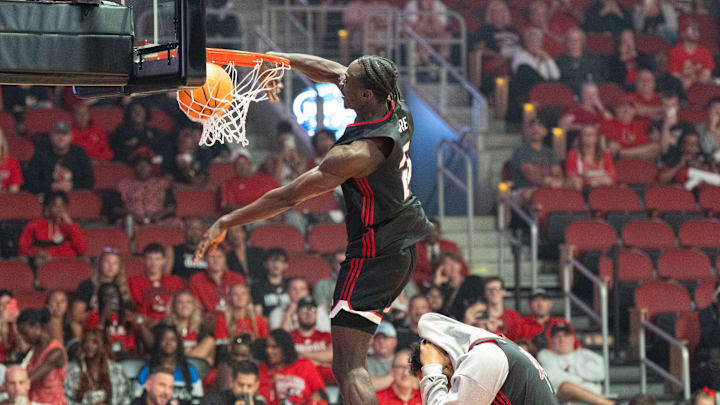 Louisville Cardinals forward Aboubacar Traore (25) dunks the ball over Aly Khalifa (15) during the dunk contest during Louisville Live on Friday, Oct. 4, 2024 at the KFC Yum! Center. Louisville Cardinals forward Aboubacar Traore (25) dunks the ball over Aly Khalifa (15) during the dunk contest during Louisville Live on Friday, Oct. 4, 2024 at the KFC Yum! Center.