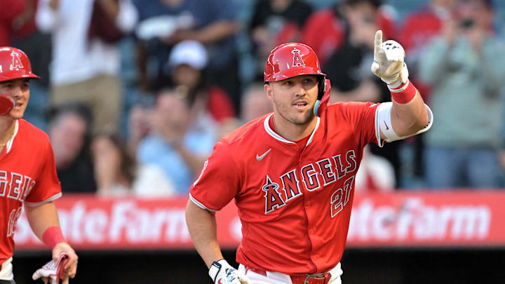 Apr 9, 2024; Anaheim, California, USA;  Los Angeles Angels outfielder Mike Trout (27) crosses the plate after hitting a two run home run in the first inning against the Tampa Bay Rays at Angel Stadium. Mandatory Credit: Jayne Kamin-Oncea-Imagn Images