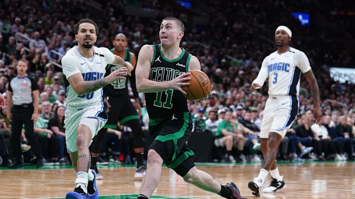 Apr 29, 2025; Boston, Massachusetts, USA; Boston Celtics guard Payton Pritchard (11) drives the ball against Orlando Magic guard Cole Anthony (50) in the third quarter during game five of first round for the 2025 NBA Playoffs at TD Garden. Mandatory Credit: David Butler II-Imagn Images Apr 29, 2025; Boston, Massachusetts, USA; Boston Celtics guard Payton Pritchard (11) drives the ball against Orlando Magic guard Cole Anthony (50) in the third quarter during game five of first round for the 2025 NBA Playoffs at TD Garden. Mandatory Credit: David Butler II-Imagn Images
