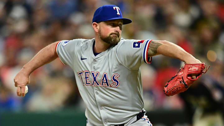 Aug 23, 2024; Cleveland, Ohio, USA; Texas Rangers relief pitcher Kirby Yates (39) throws a pitch during the ninth inning against the Cleveland Guardians at Progressive Field. Aug 23, 2024; Cleveland, Ohio, USA; Texas Rangers relief pitcher Kirby Yates (39) throws a pitch during the ninth inning against the Cleveland Guardians at Progressive Field.