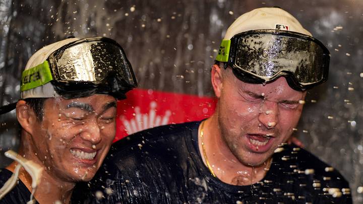 Sep 17, 2026; Cincinnati, Ohio, USA;  Los Angeles Dodgers pitcher Yoshinobu Yamamoto, left, and pitcher Tarik Skubal, right, celebrate after clinching the National League West title after the game against the Cincinnati Reds at Great American Ball Park. Mandatory Credit: Aaron Doster-Imagn Images