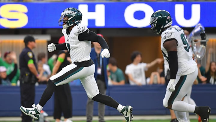 Oct 8, 2023; Inglewood, California, USA; Philadelphia Eagles linebacker Haason Reddick (7) celebrates after sacking Los Angeles Rams quarterback Matthew Stafford (9) during the second half at SoFi Stadium. Mandatory Credit: Gary A. Vasquez-Imagn Images