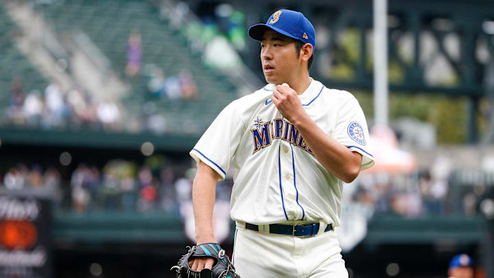 Seattle Mariners starting pitcher Yusei Kikuchi (18) walks to the dugout following to the final out of the top of the fourth inning against the Arizona Diamondbacks at T-Mobile Park in 2021.