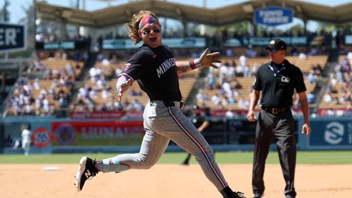 Jul 23, 2025; Los Angeles, California, USA; Minnesota Twins pinch hitter Harrison Bader (12) reacts after hitting an RBI single during the eighth inning against the Los Angeles Dodgers at Dodger Stadium. Mandatory Credit: Kiyoshi Mio-Imagn Images Jul 23, 2025; Los Angeles, California, USA; Minnesota Twins pinch hitter Harrison Bader (12) reacts after hitting an RBI single during the eighth inning against the Los Angeles Dodgers at Dodger Stadium. Mandatory Credit: Kiyoshi Mio-Imagn Images