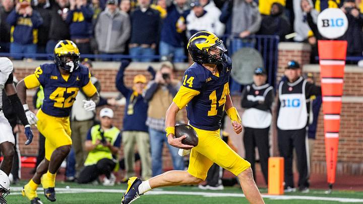 Michigan quarterback Tommy Carr runs into the end zone for a touchdown against Penn State late in the fourth quarter at Michigan Stadium in Ann Arbor on Saturday, Oct. 17, 2026.